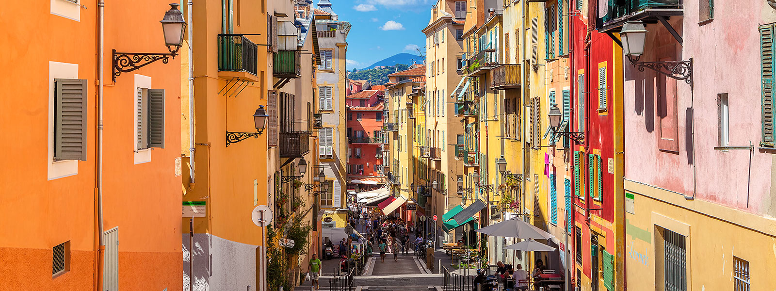 A street lined with colorful buildings